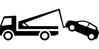 A Tow Truck Towing a Car